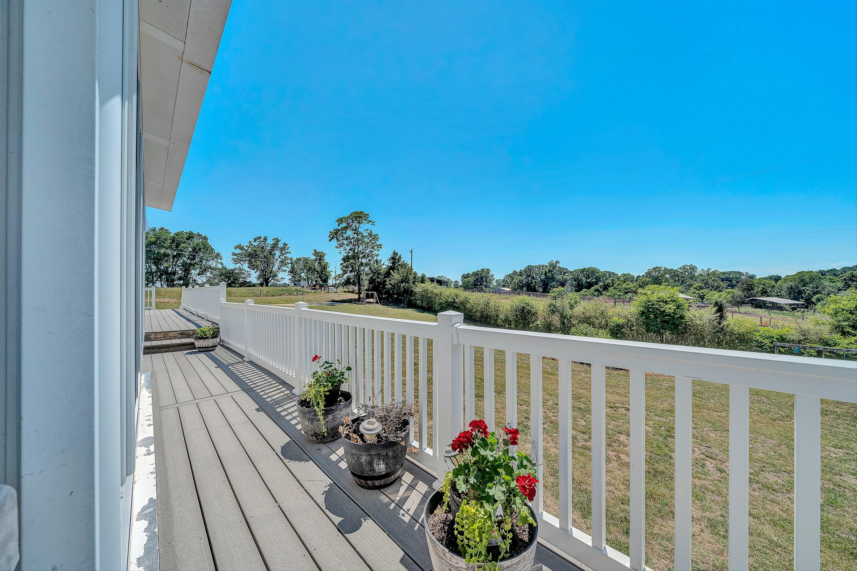 159 Simmons Creek Road Union Hall, VA 24176 - Photo 36 of 55 a view of a balcony with wooden floor