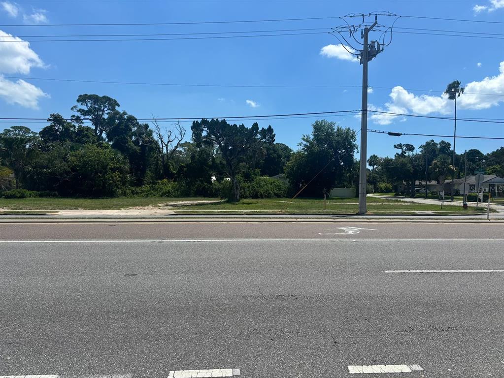 411 South Ridgewood Avenue Edgewater, FL 32132 - Photo 1 of 1 a view of a tennis court
