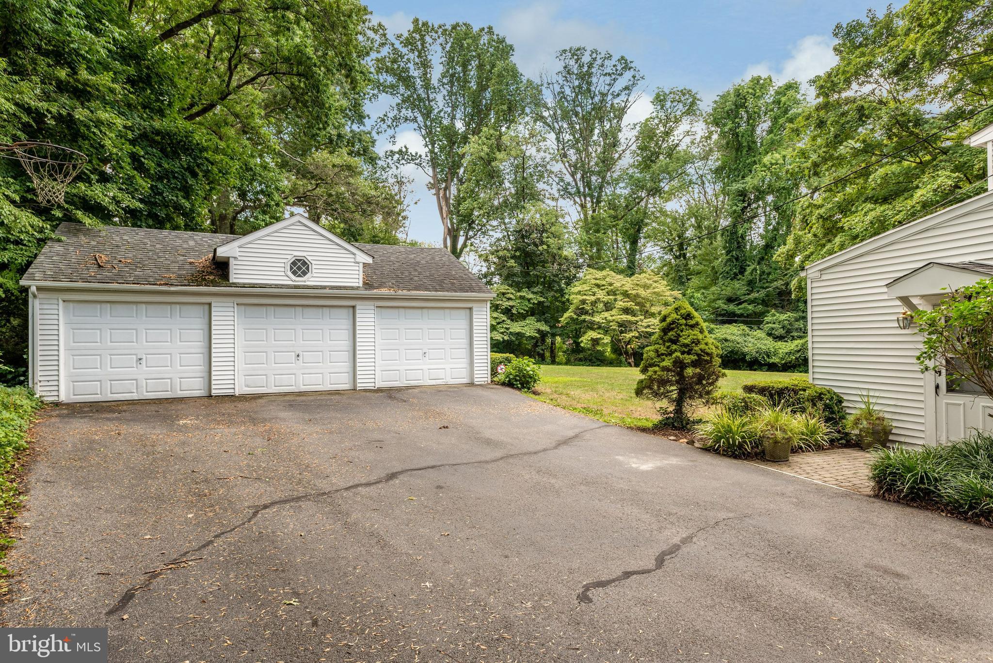 28 Brookside Road Wallingford, PA 19086 - Photo 40 of 49 Driveway and 5-car garage/workshop