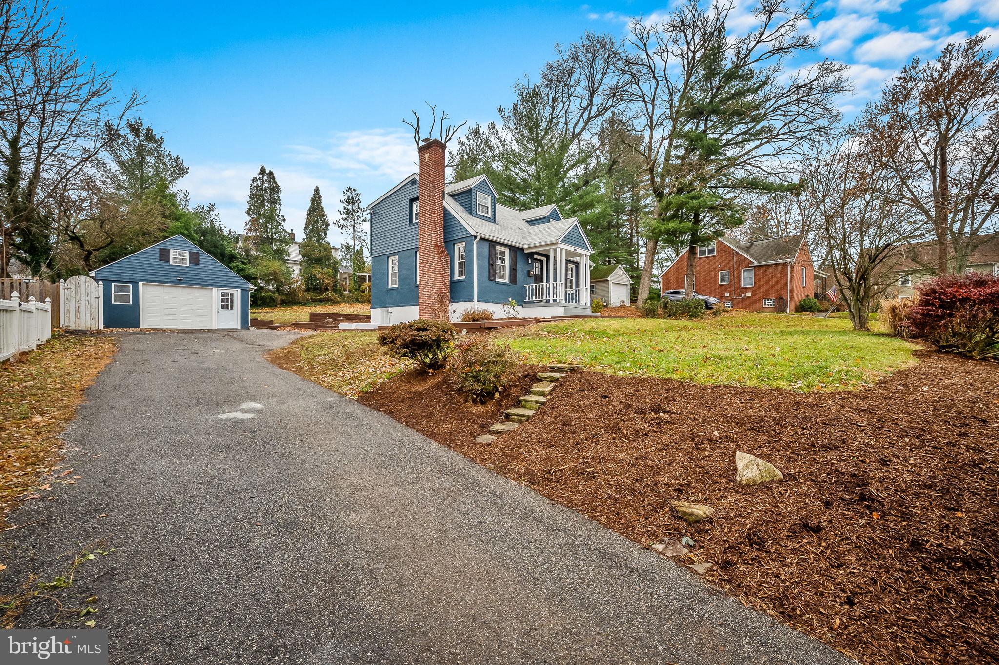 67 Cinder Road Lutherville-Timonium, MD 21093 - Photo 3 of 47 Asphalt driveway w/ detached garage