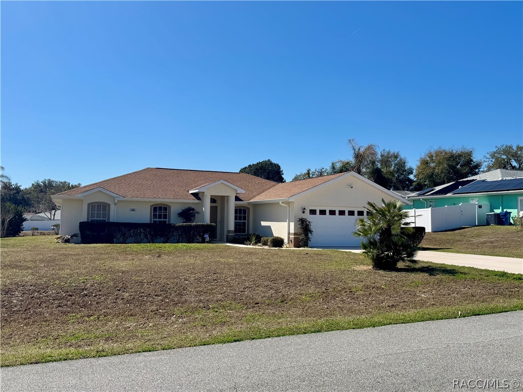 4588 East Van Ness Road Inverness, FL 34453 - Photo 32 of 34 a view of front of house with yard