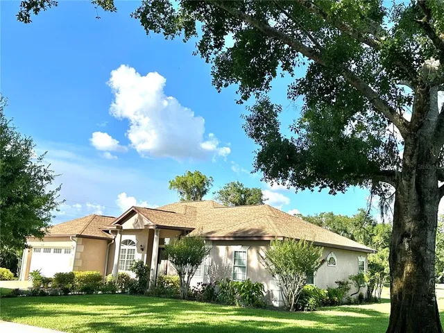 a kitchen with stainless steel appliances a refrigerator and a sink