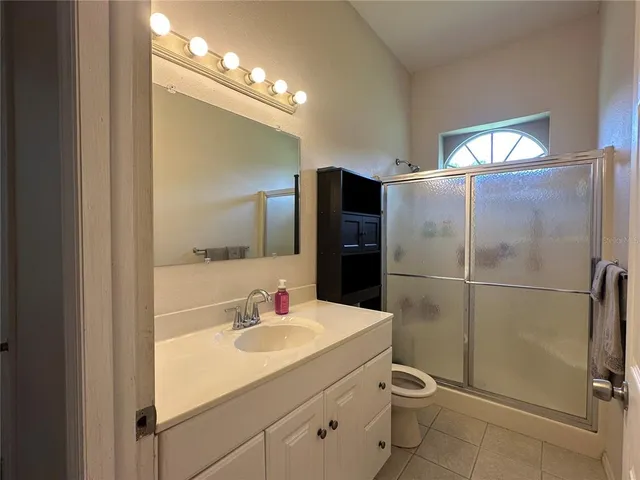 a kitchen with a sink and a stove top oven