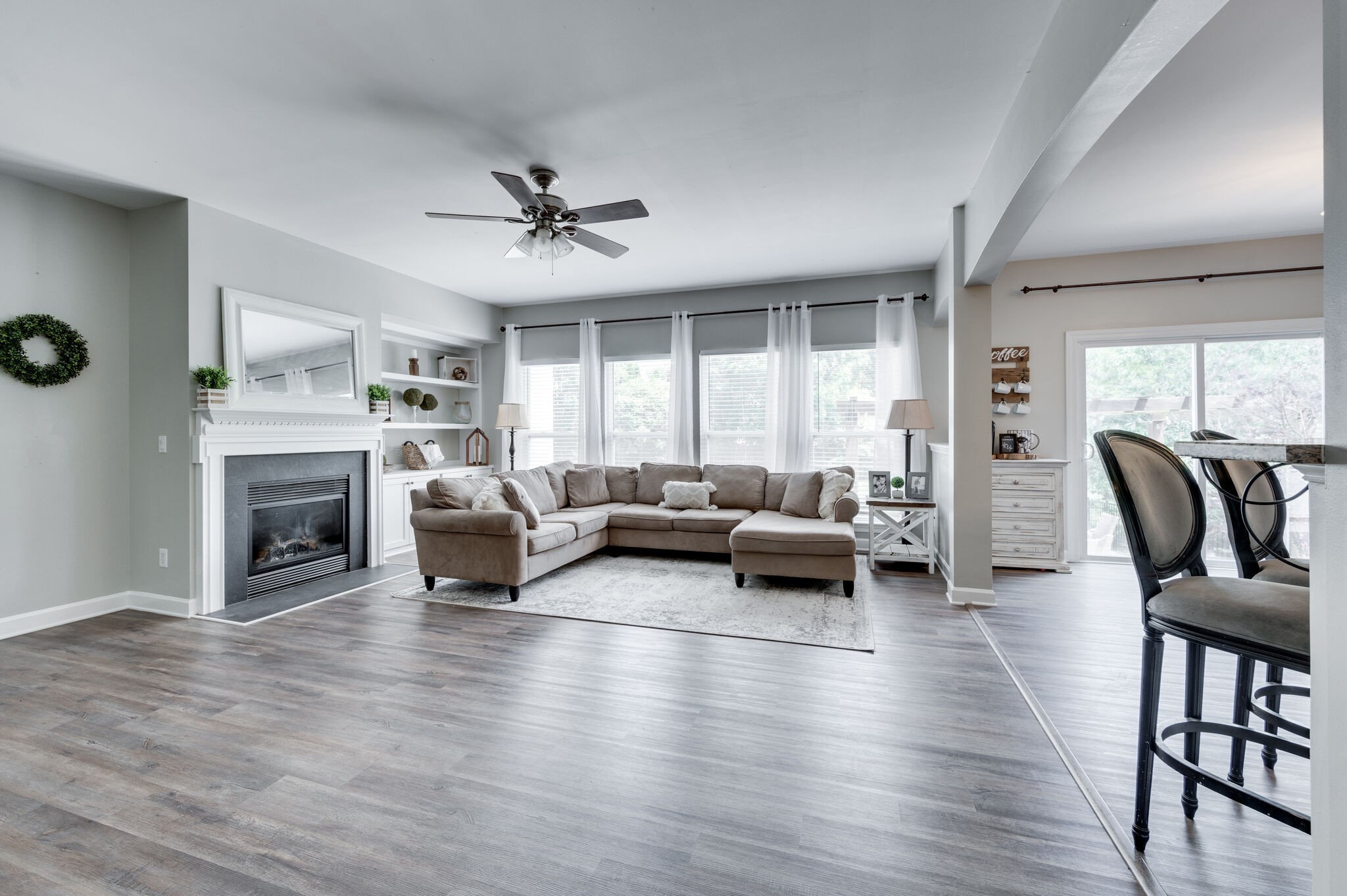 2047 Belshire Way Spring Hill, TN 37174 - Photo 15 of 54 a living room with furniture or fireplace and a wooden floor