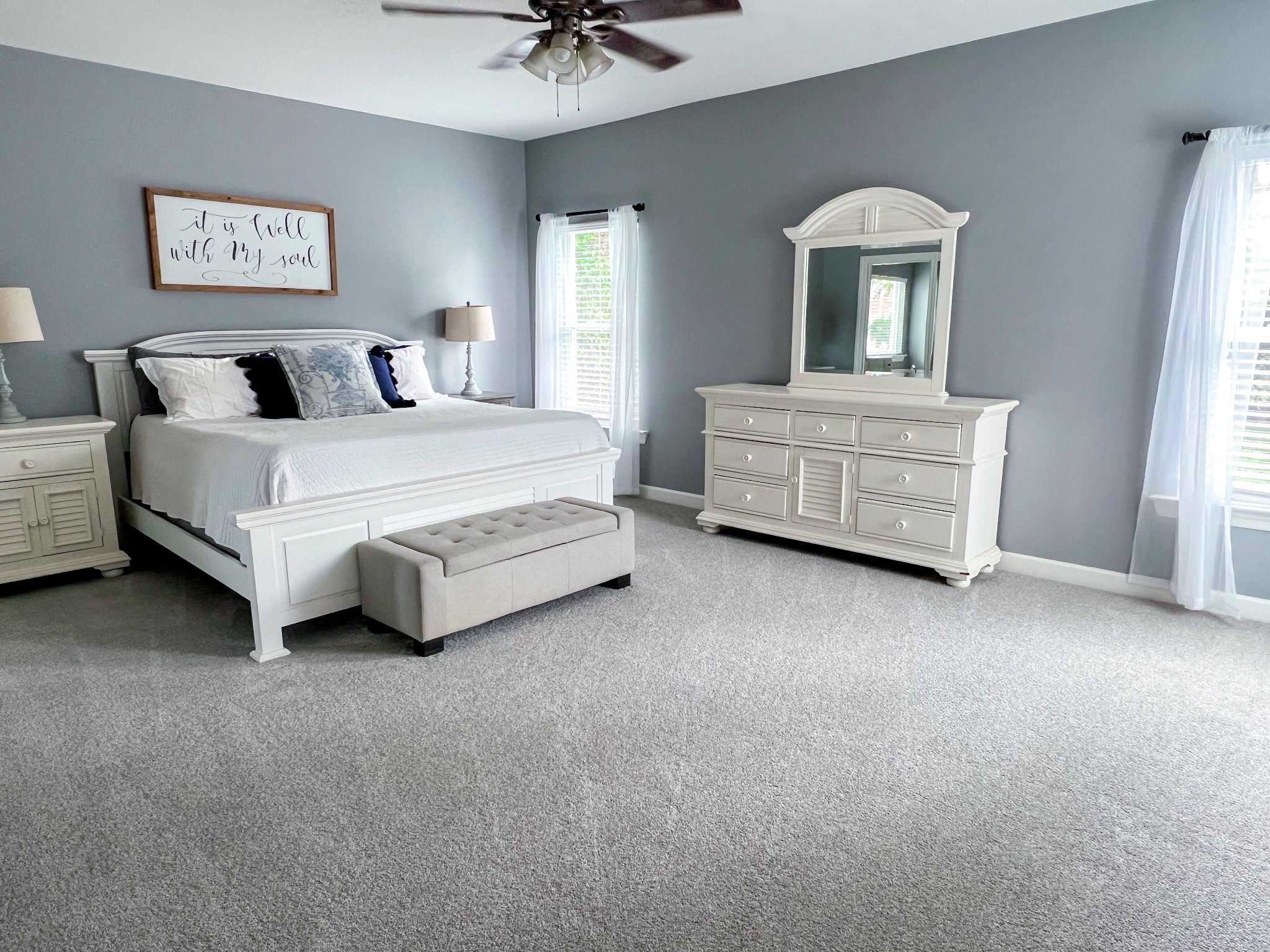 2047 Belshire Way Spring Hill, TN 37174 - Photo 27 of 54 a bed room with a bed and a chandelier