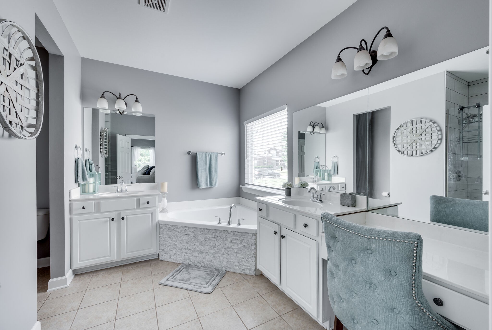2047 Belshire Way Spring Hill, TN 37174 - Photo 30 of 54 a bathroom with a granite countertop bathtub sink and mirror
