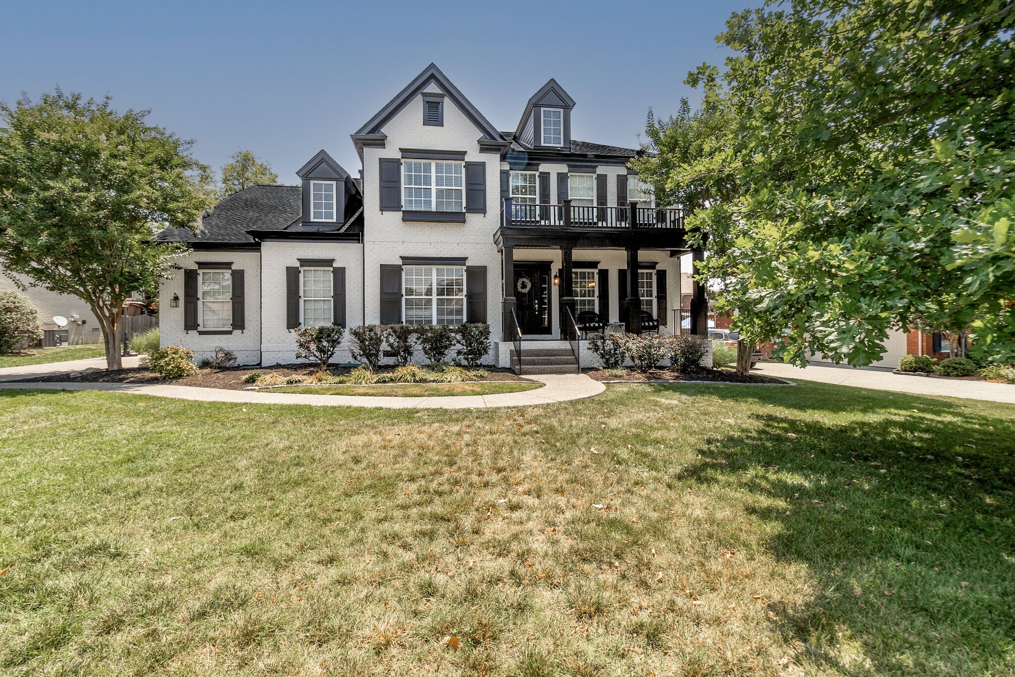 2047 Belshire Way Spring Hill, TN 37174 - Photo 3 of 54 a front view of a building with street view
