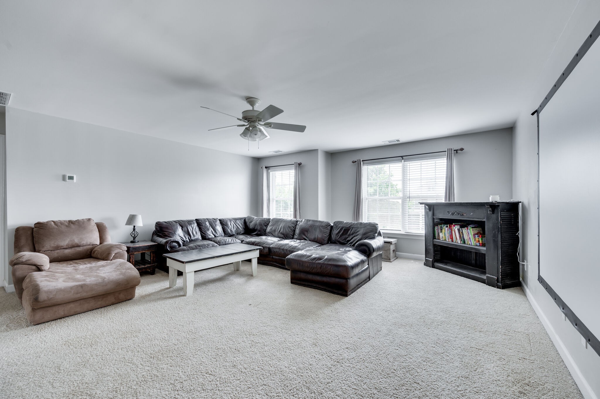 2047 Belshire Way Spring Hill, TN 37174 - Photo 33 of 54 a living room with furniture and a fireplace