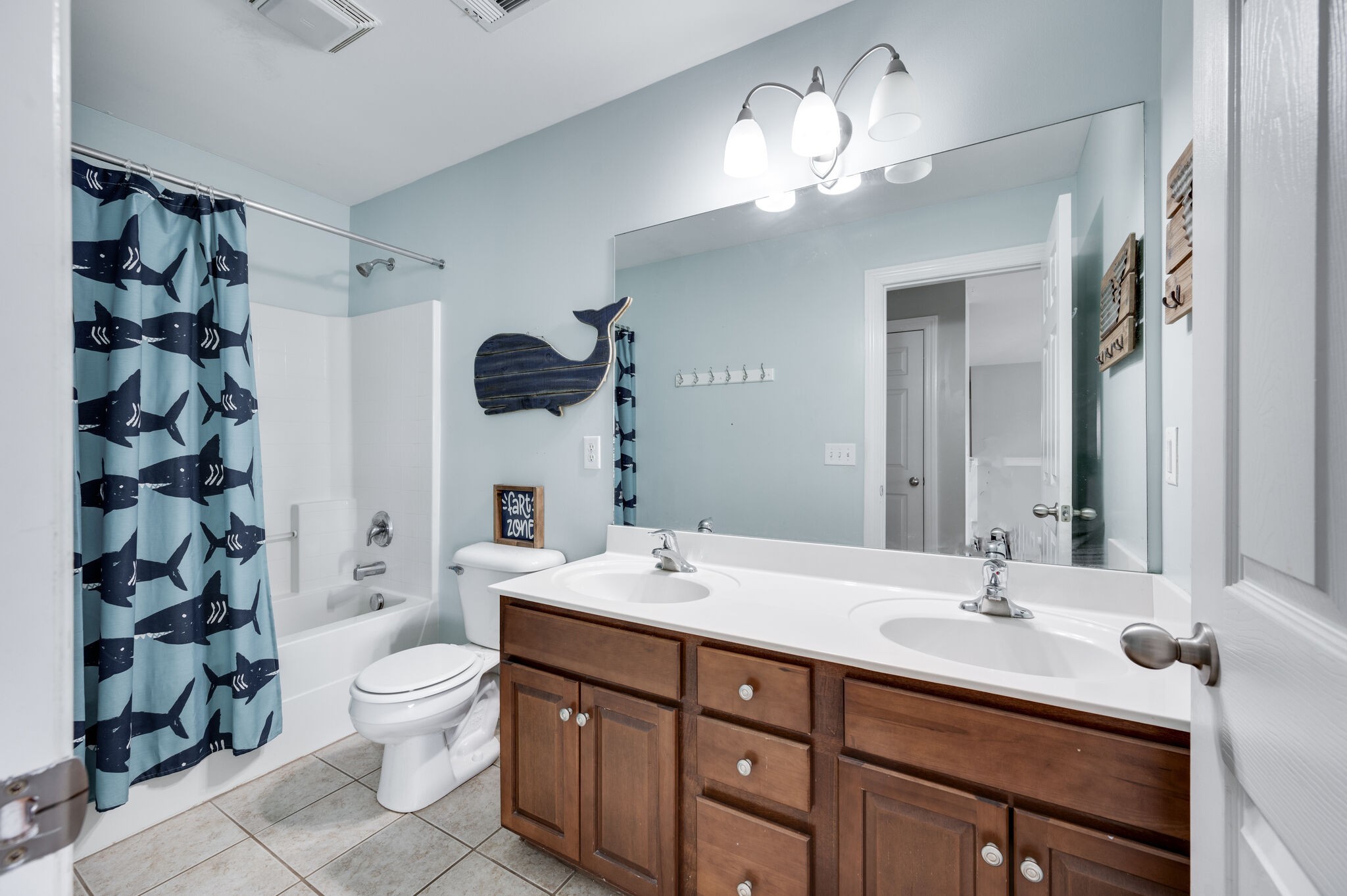 2047 Belshire Way Spring Hill, TN 37174 - Photo 38 of 54 a bathroom with a double vanity sink mirror and toilet