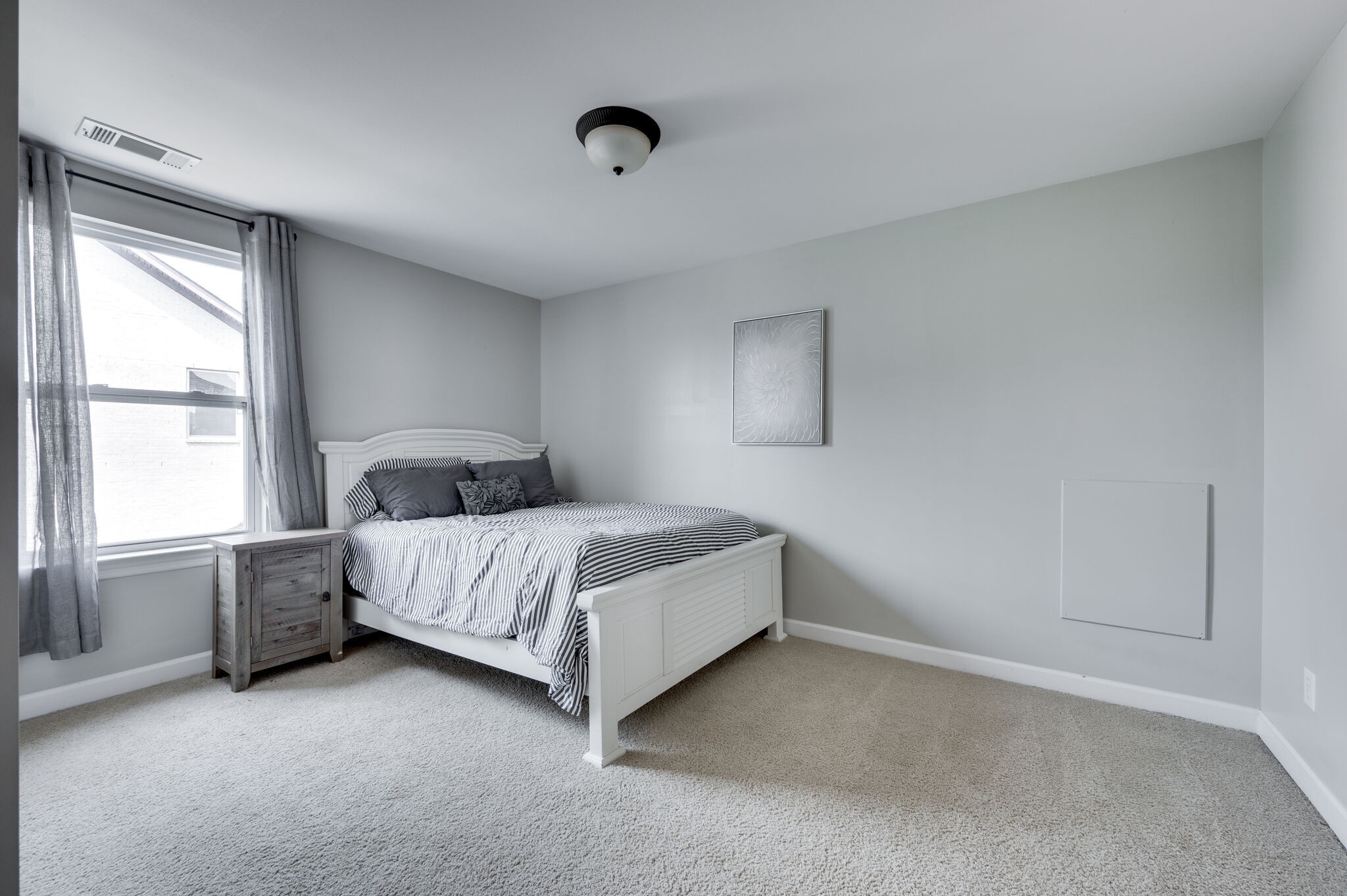 2047 Belshire Way Spring Hill, TN 37174 - Photo 40 of 54 a bedroom with a bed and a window