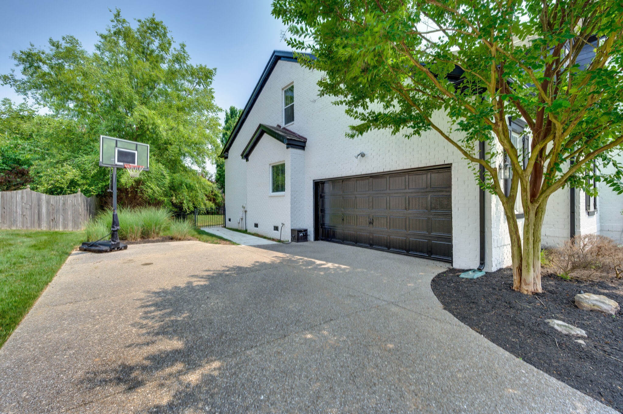 2047 Belshire Way Spring Hill, TN 37174 - Photo 45 of 54 a front view of a house with a yard and garage