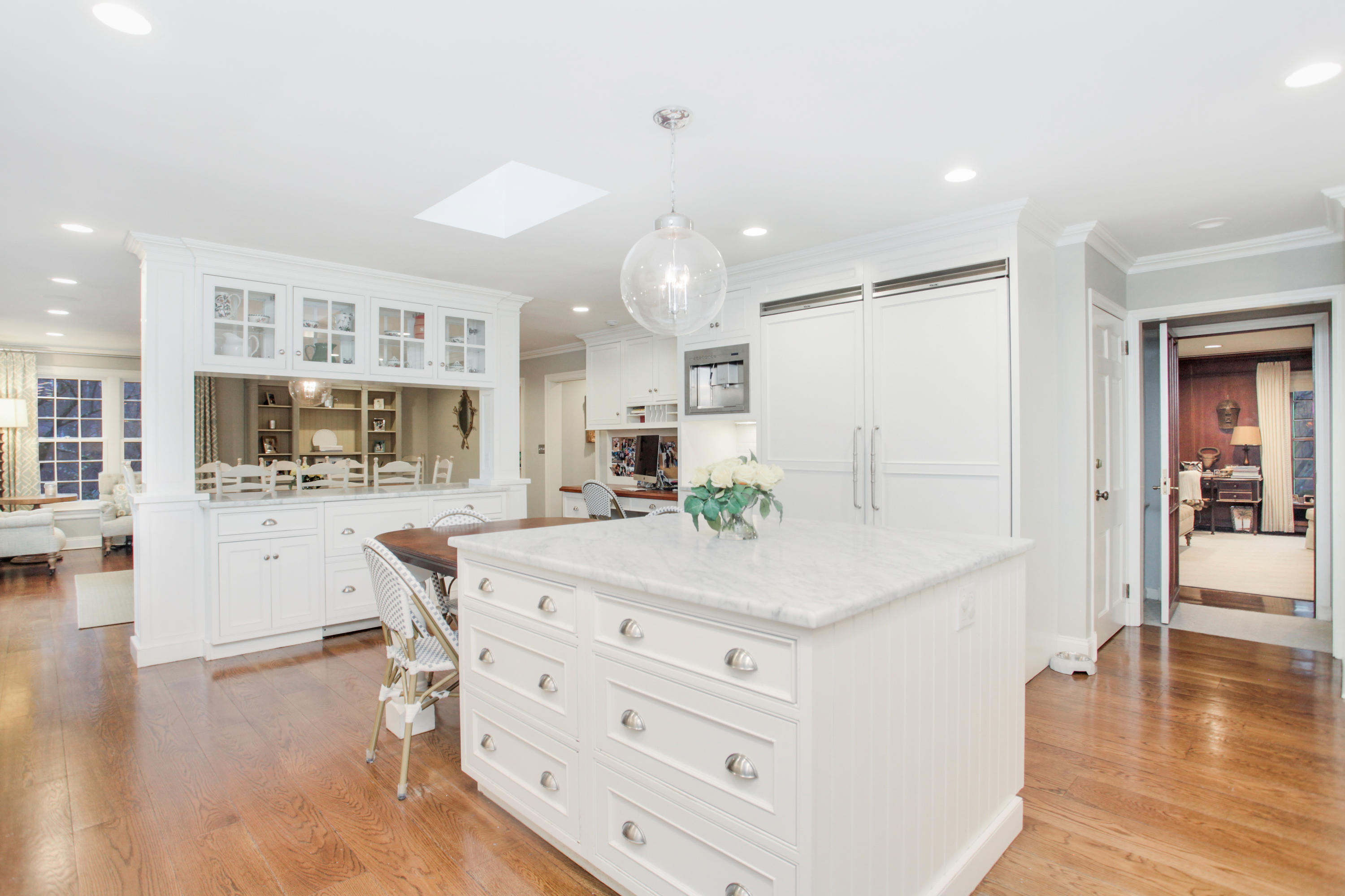 6 Hummingbird Lane Darien, CT 06820 - Photo 11 of 35 a kitchen with a table and chairs in it