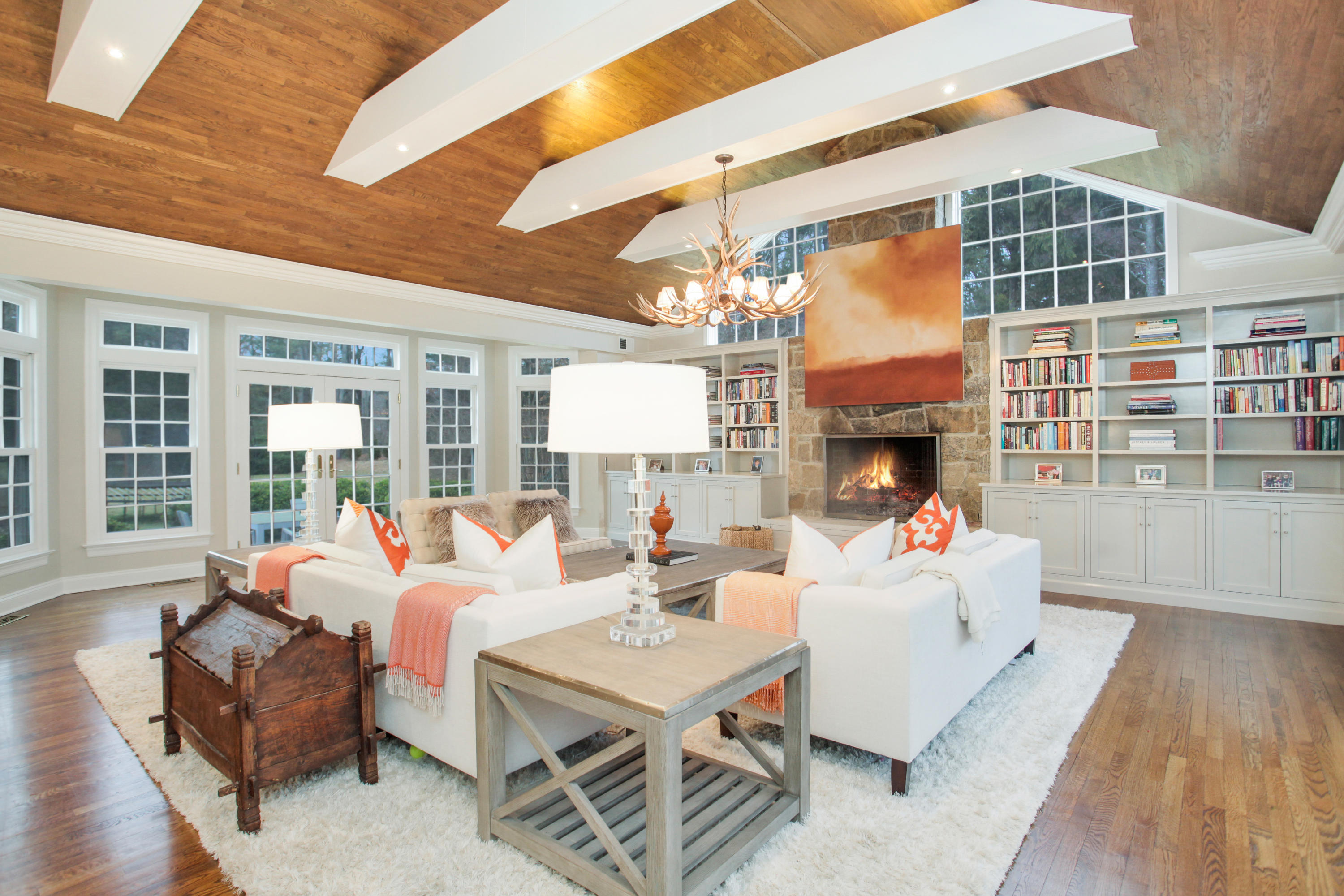 6 Hummingbird Lane Darien, CT 06820 - Photo 14 of 35 a living room with fireplace furniture and a large window