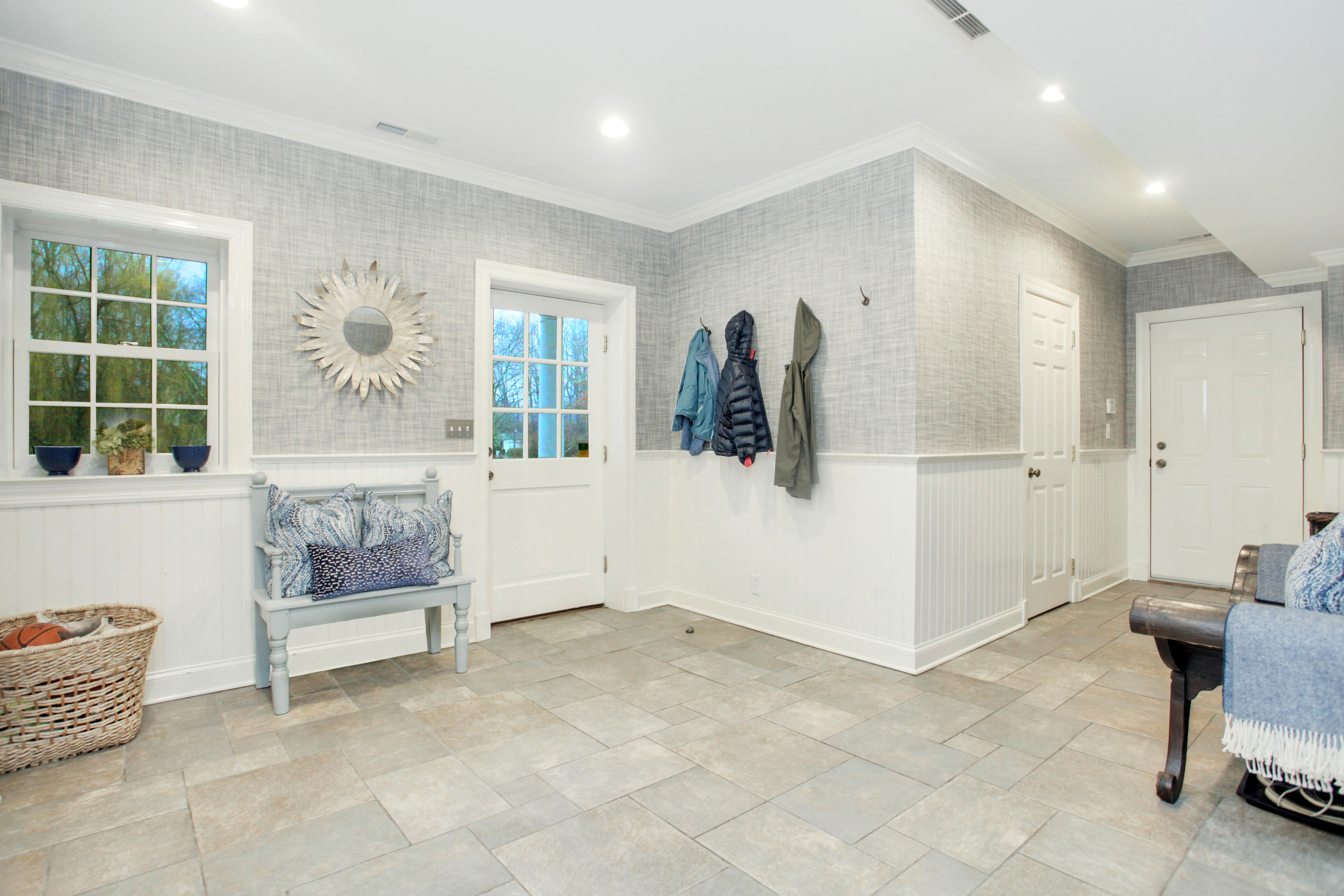 6 Hummingbird Lane Darien, CT 06820 - Photo 17 of 35 a view of a livingroom with furniture and windows