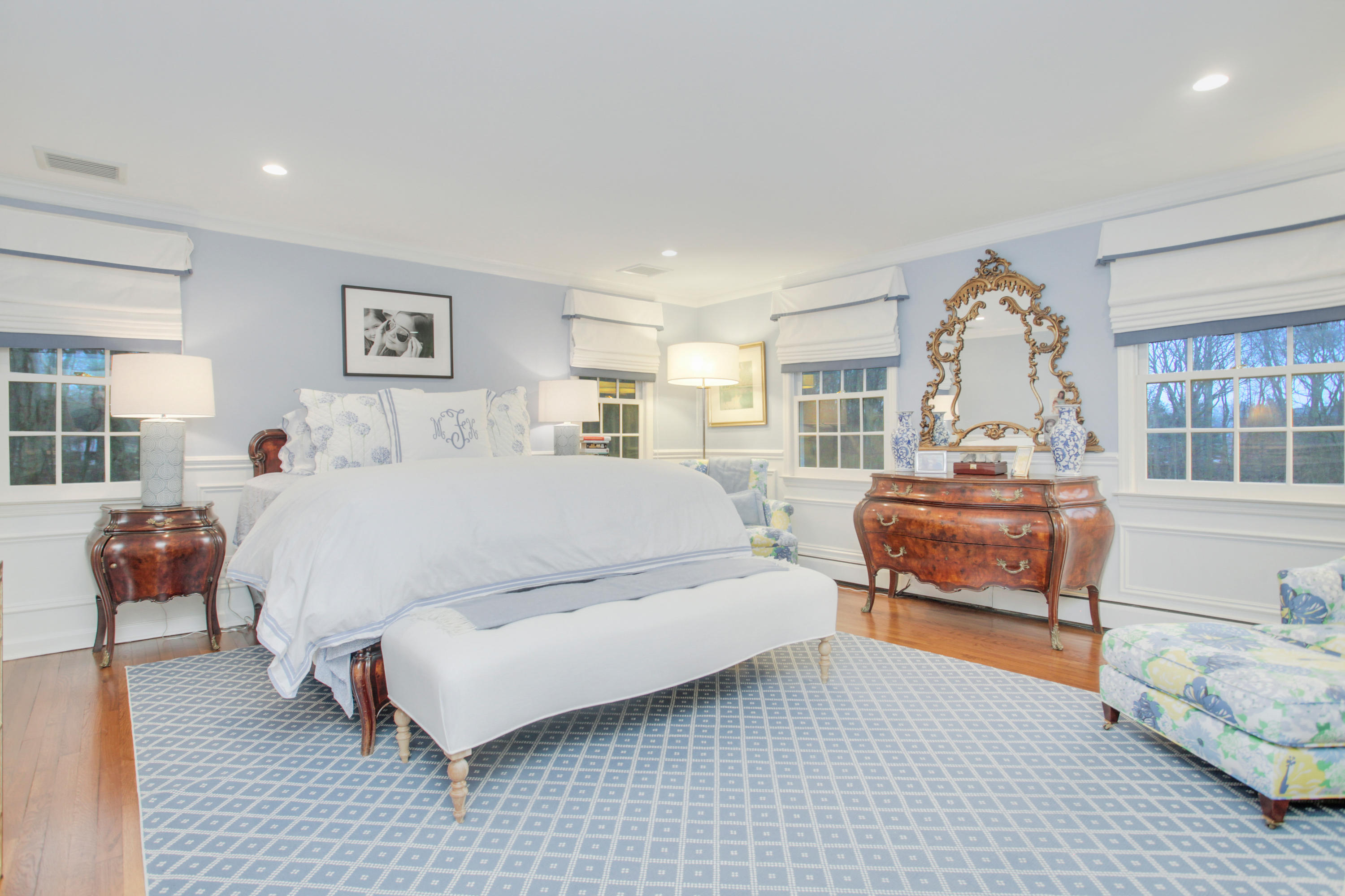 6 Hummingbird Lane Darien, CT 06820 - Photo 21 of 35 a living room with furniture and a large window