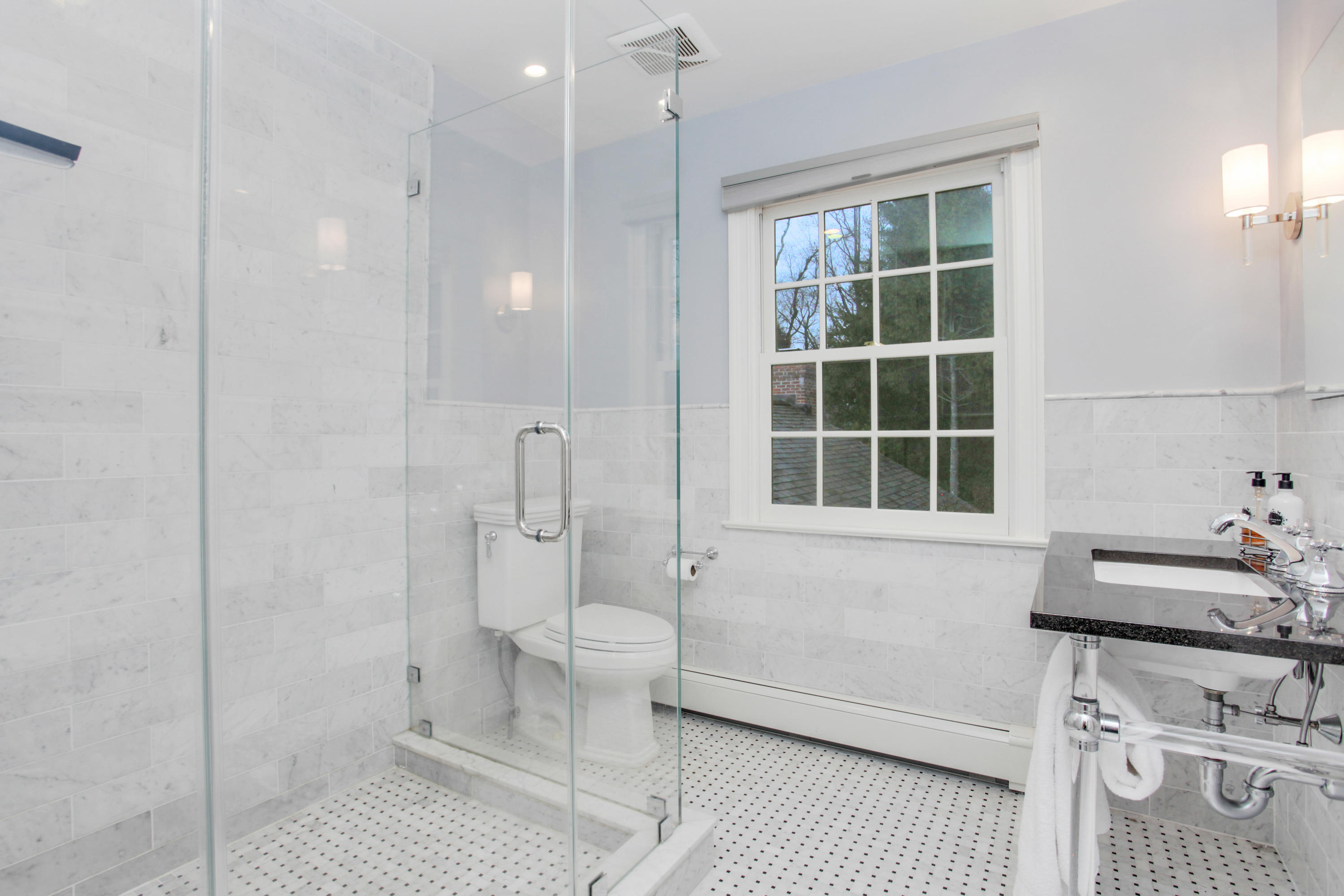 6 Hummingbird Lane Darien, CT 06820 - Photo 27 of 35 a bathroom with a sink toilet and shower