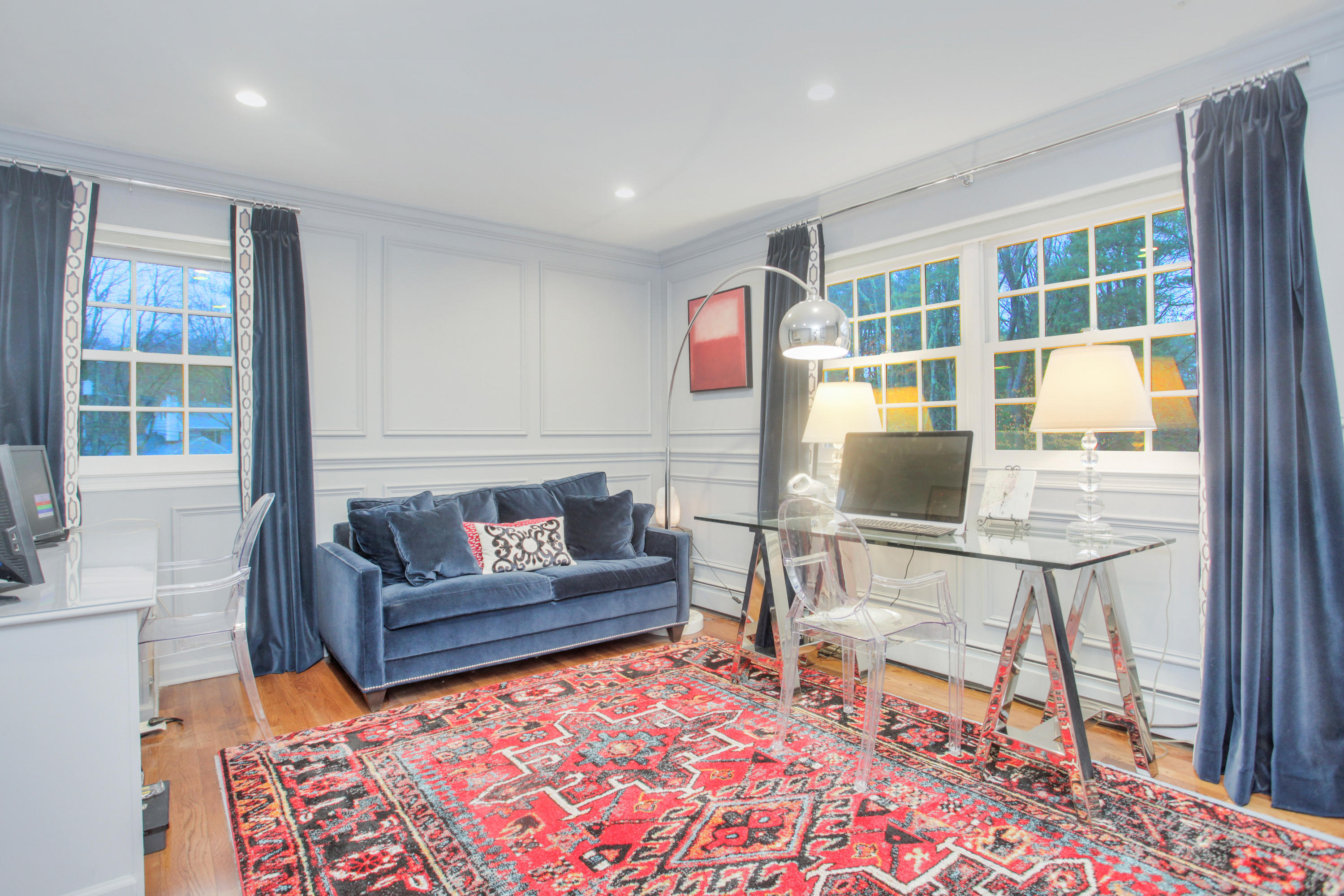 6 Hummingbird Lane Darien, CT 06820 - Photo 28 of 35 a living room with furniture and a table