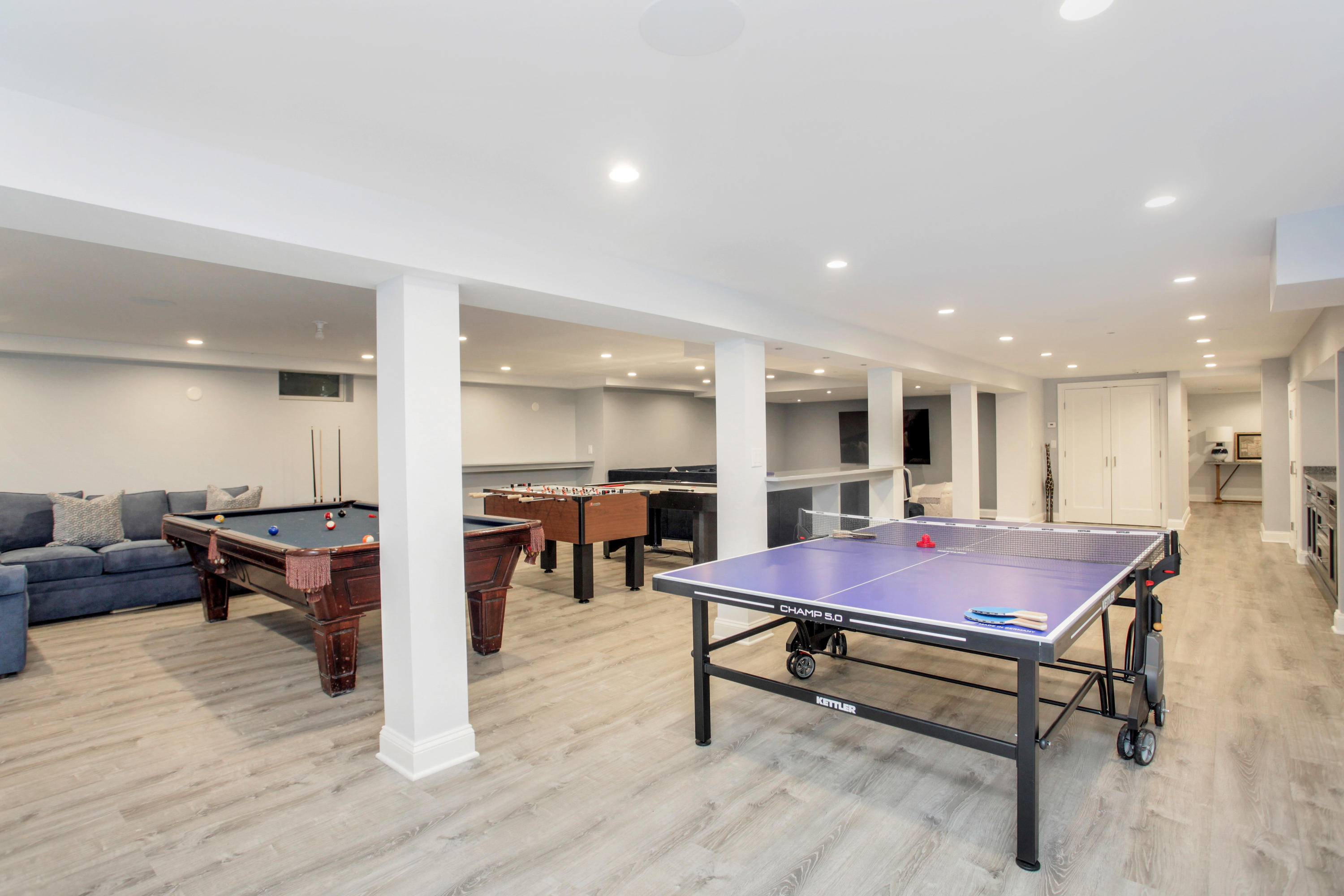 6 Hummingbird Lane Darien, CT 06820 - Photo 30 of 35 a dining room with furniture and wooden floor