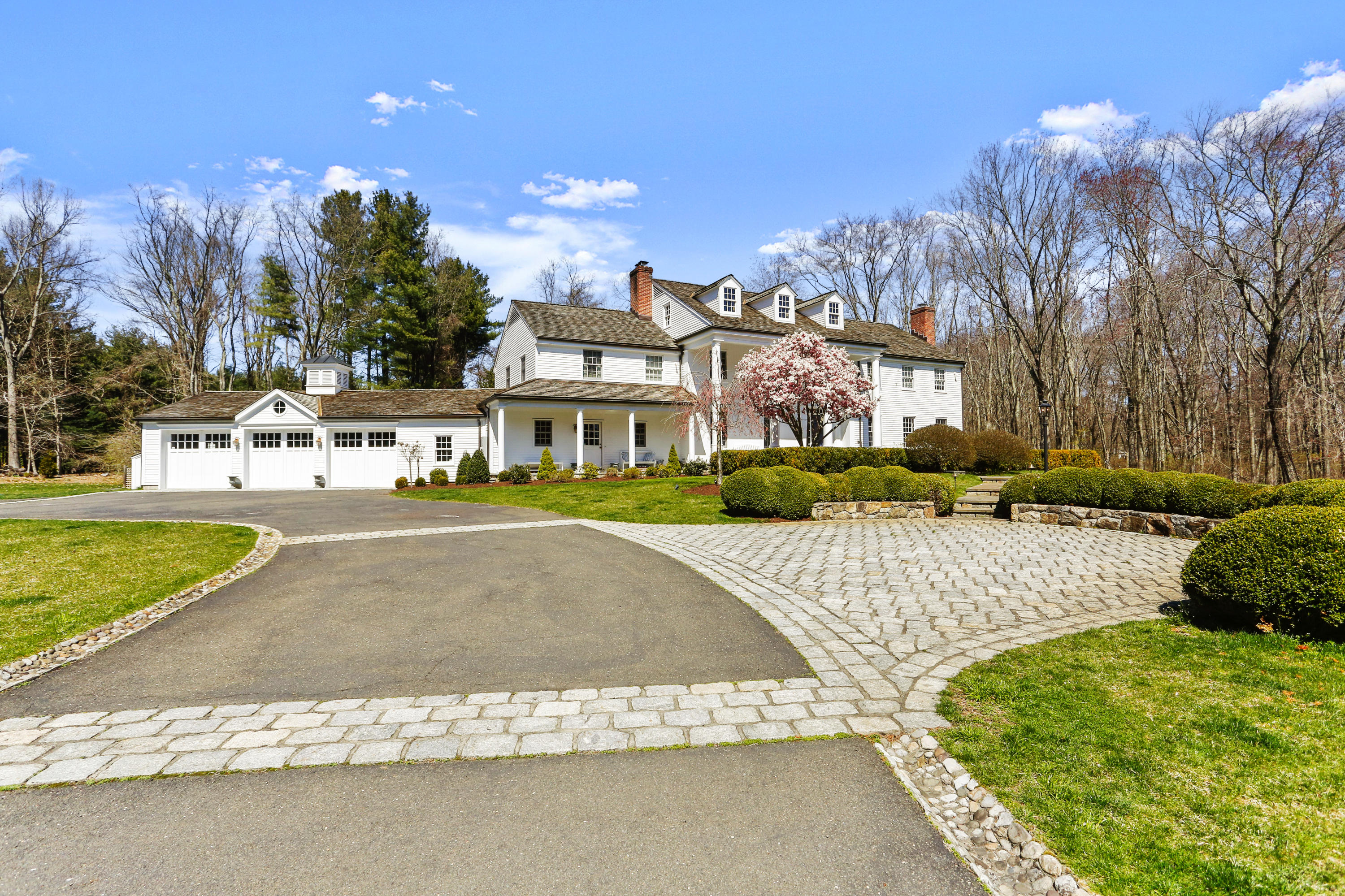 6 Hummingbird Lane Darien, CT 06820 - Photo 31 of 35 a view of a swimming pool with a patio and a yard