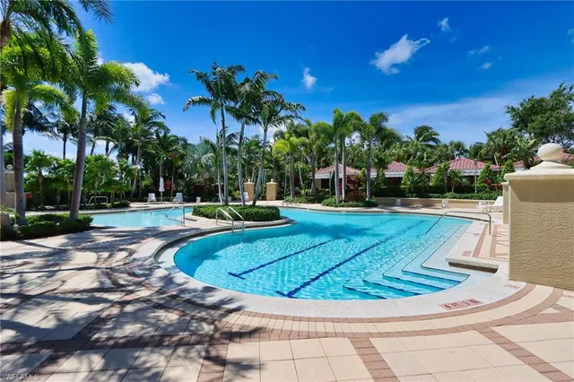 a view of a swimming pool with a sitting space