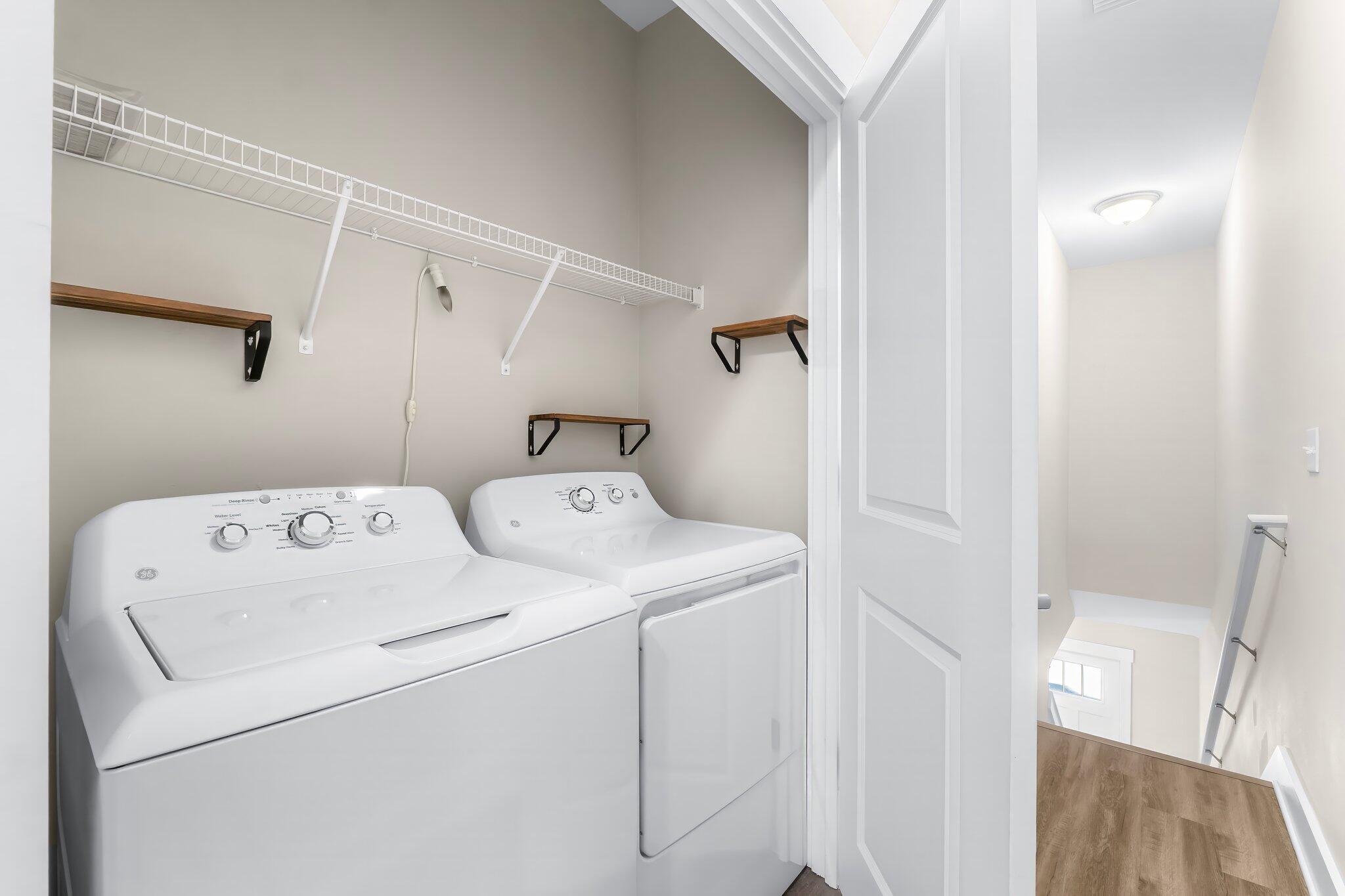 330 North Sand Palm Road, Unit VISTA Freeport, FL 32439 - Photo 17 of 38 a utility room with dryer and washer