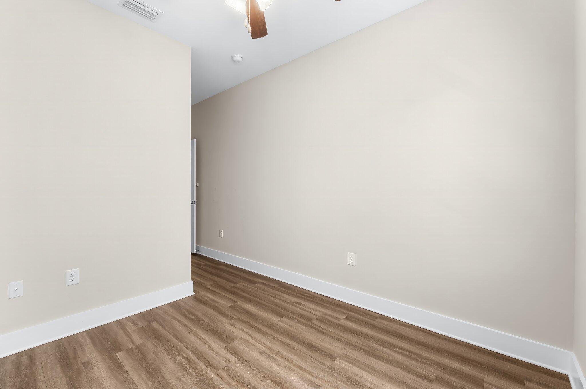 330 North Sand Palm Road, Unit VISTA Freeport, FL 32439 - Photo 26 of 38 a view of a small space with wooden floor