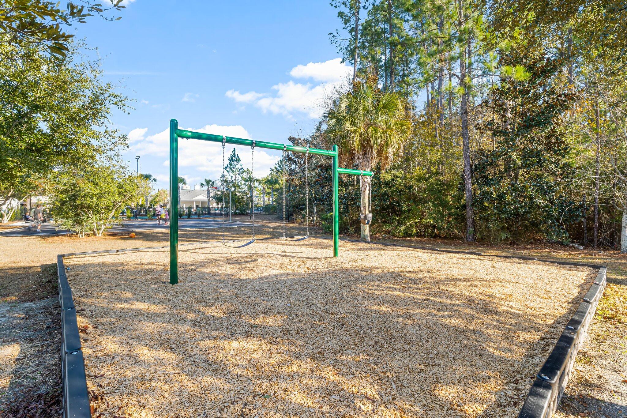 330 North Sand Palm Road, Unit VISTA Freeport, FL 32439 - Photo 38 of 38 a view of a house with backyard and a tree