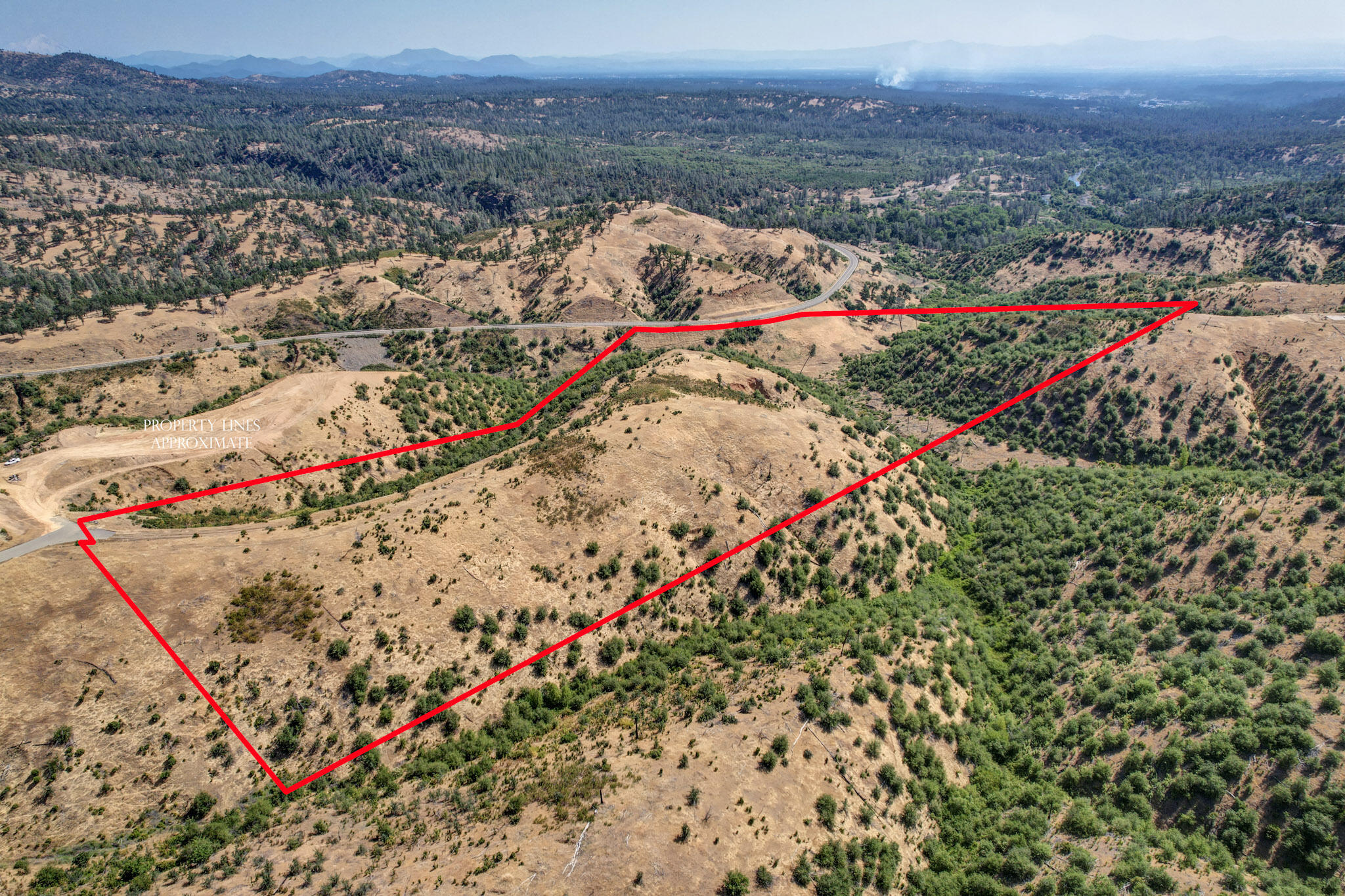 Modesta View Anderson, CA 96007 - Photo 3 of 12 an aerial view of a house and a mountain
