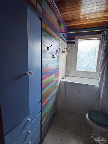 a bathroom with a bathtub