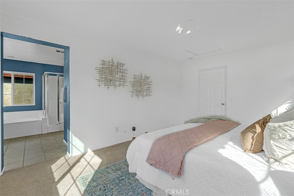 3377 Drome Lane Riverside, CA 92503 - Photo 16 of 42 Spacious primary bedroom and bath