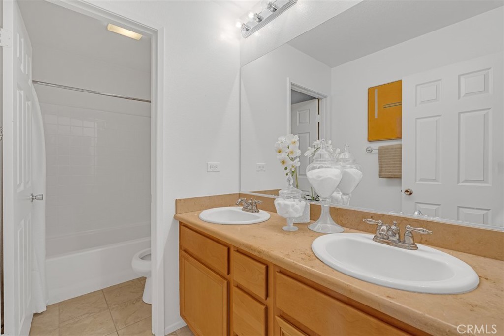 3377 Drome Lane Riverside, CA 92503 - Photo 23 of 42 Hall bathroom with dual sinks