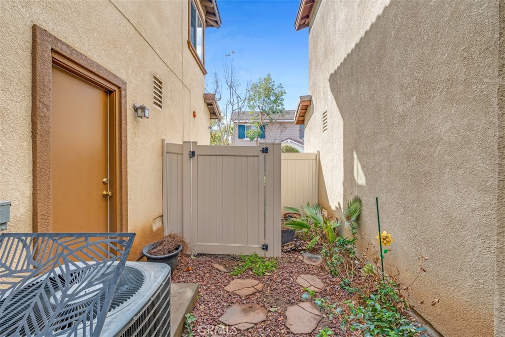 3377 Drome Lane Riverside, CA 92503 - Photo 31 of 42 Door leads to the garage and a gate to the outside