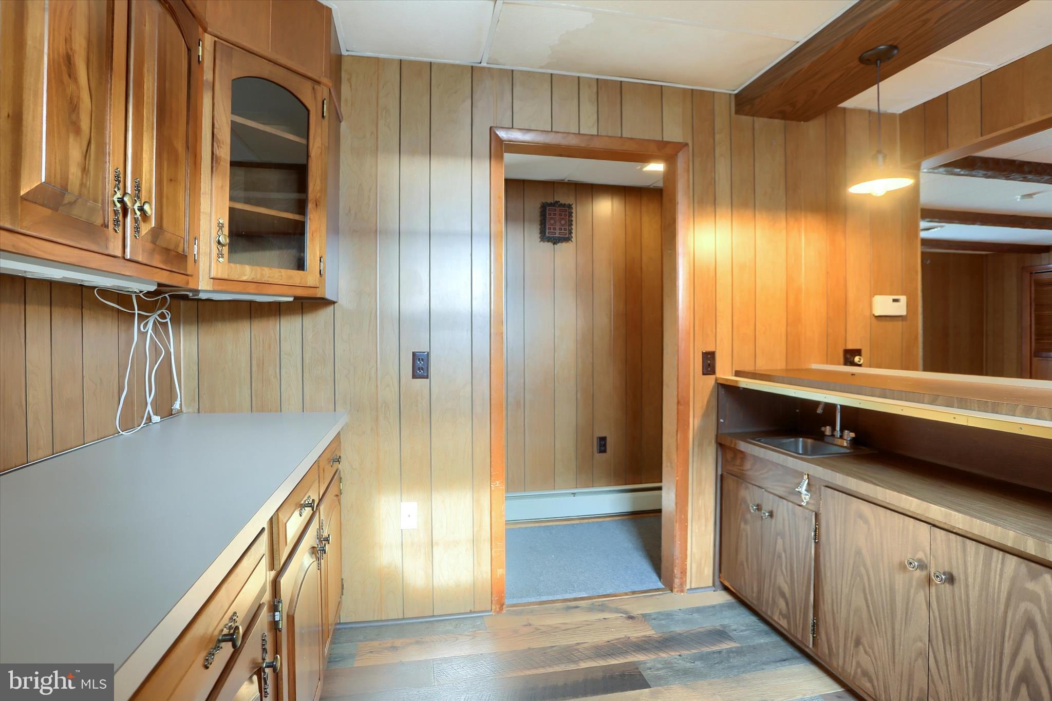 302 Park Road Valley View, PA 17983 - Photo 32 of 59 a kitchen with a refrigerator and cabinets