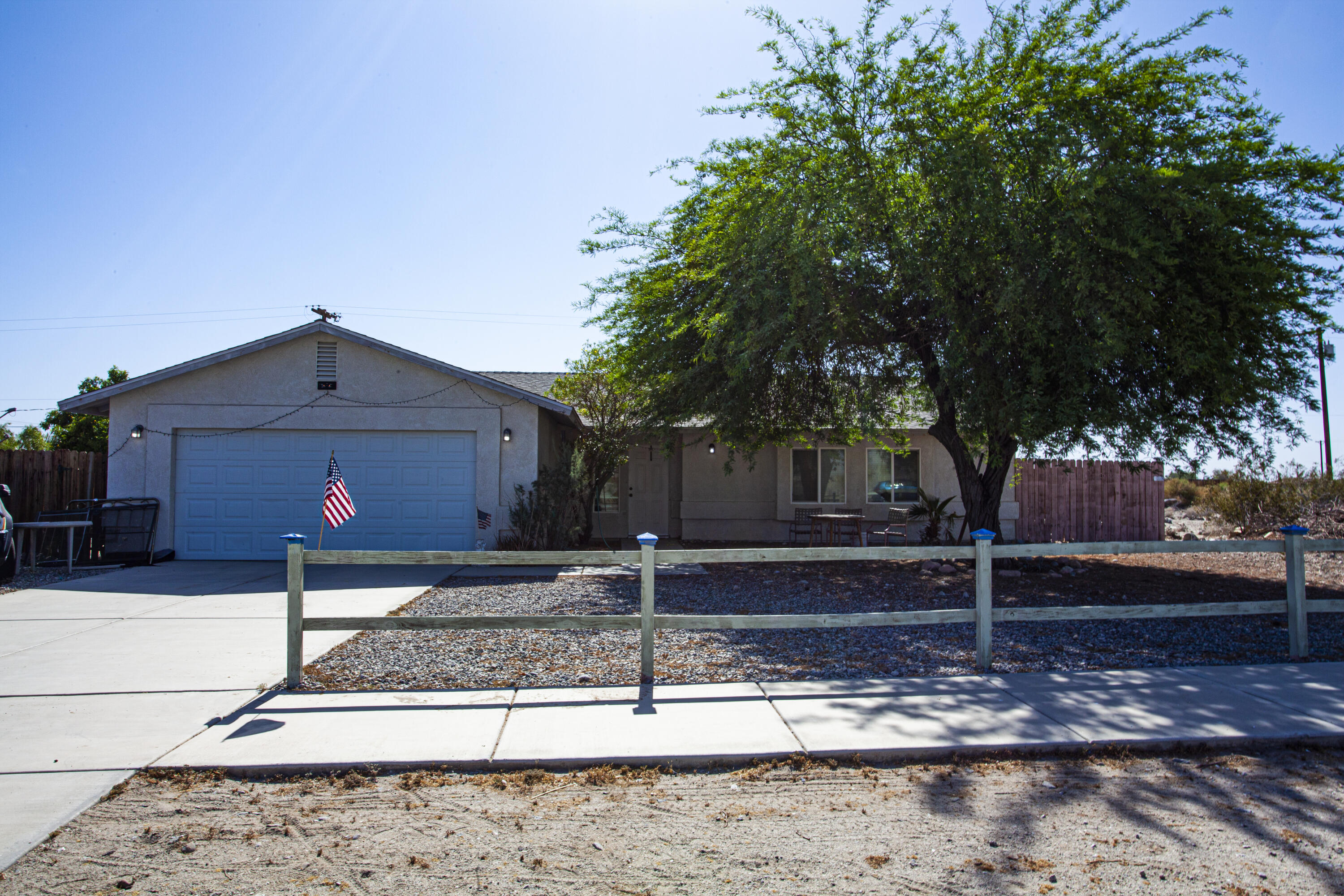 2794 Gram Drive Thermal, CA 92274 - Photo 5 of 11 a front view of a house with garden