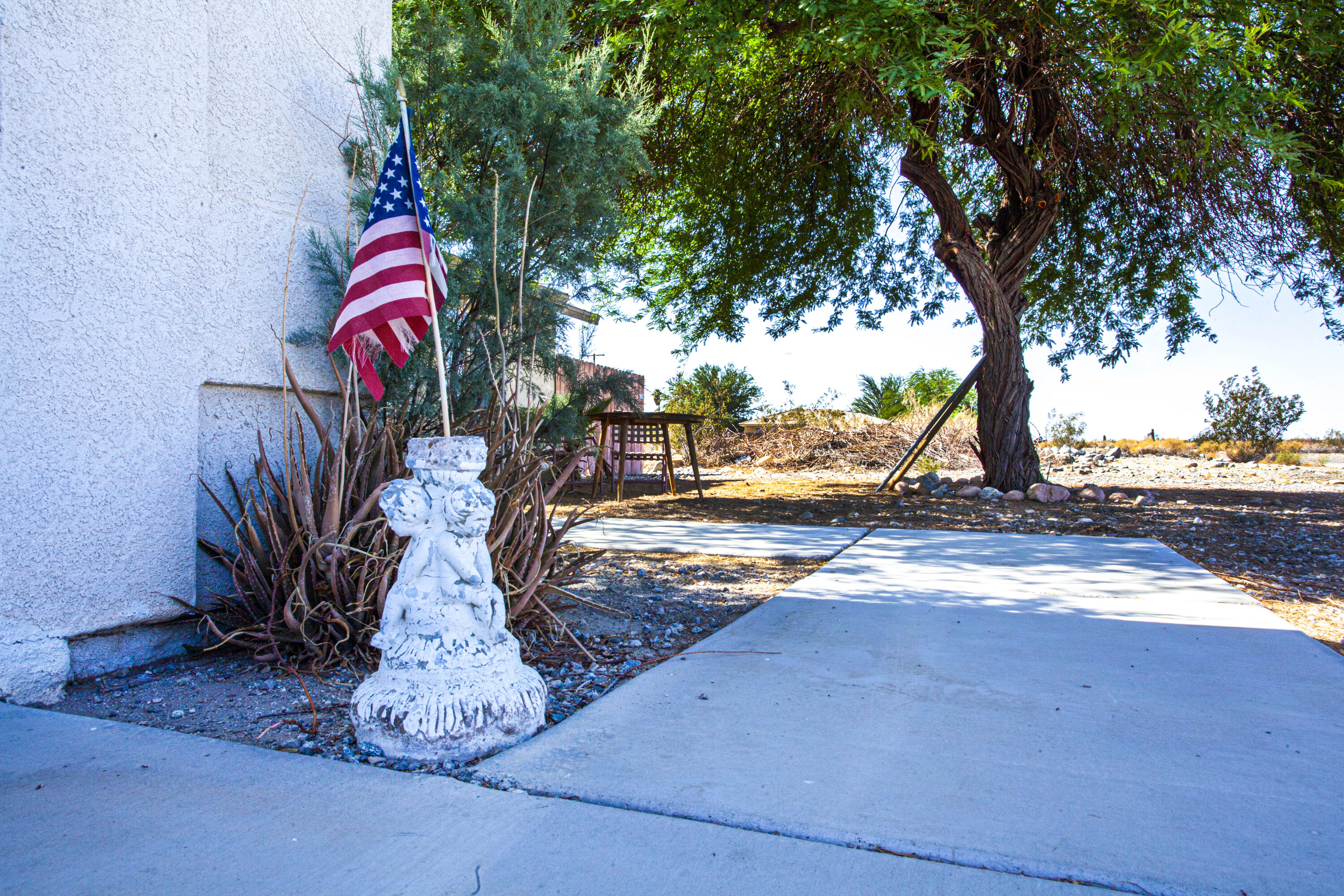 2794 Gram Drive Thermal, CA 92274 - Photo 6 of 11 a front view of a house with garden