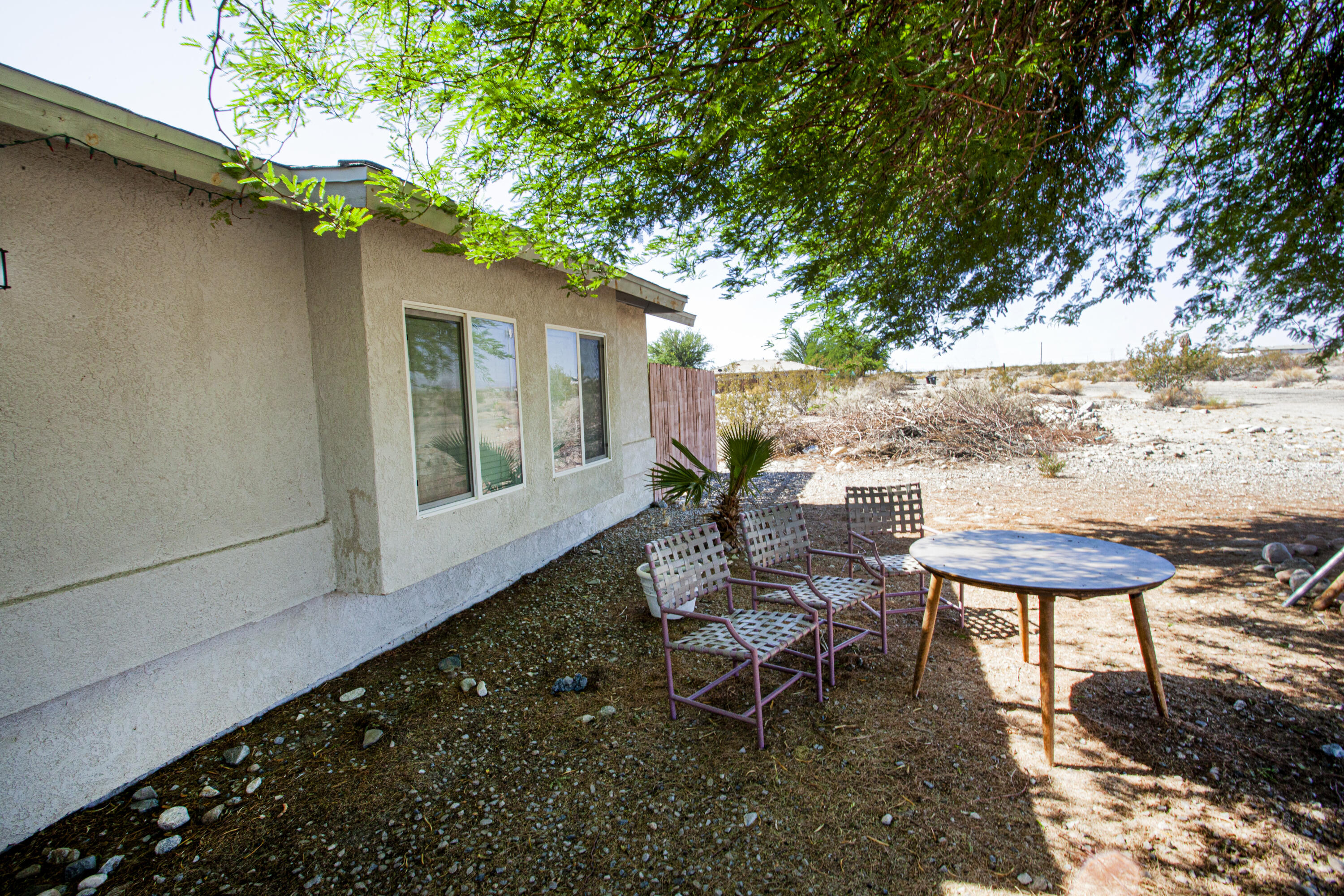 2794 Gram Drive Thermal, CA 92274 - Photo 7 of 11 a backyard of a house with table and chairs