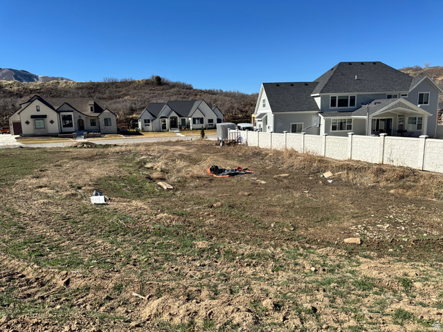 3583 South Mapleton Drive, Unit 13 Mapleton, UT 84664 - Photo 12 of 14 View of yard with a residential view and a mountain view
