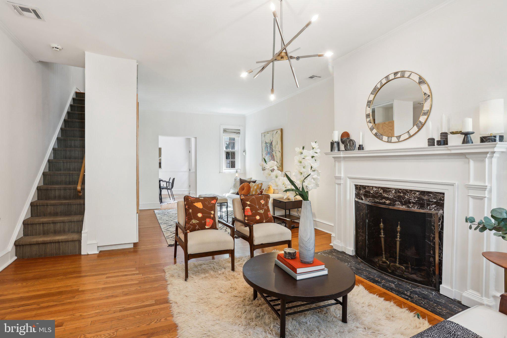 321 South Smedley Street Philadelphia, PA 19103 - Photo 14 of 39 a living room with furniture and a fireplace