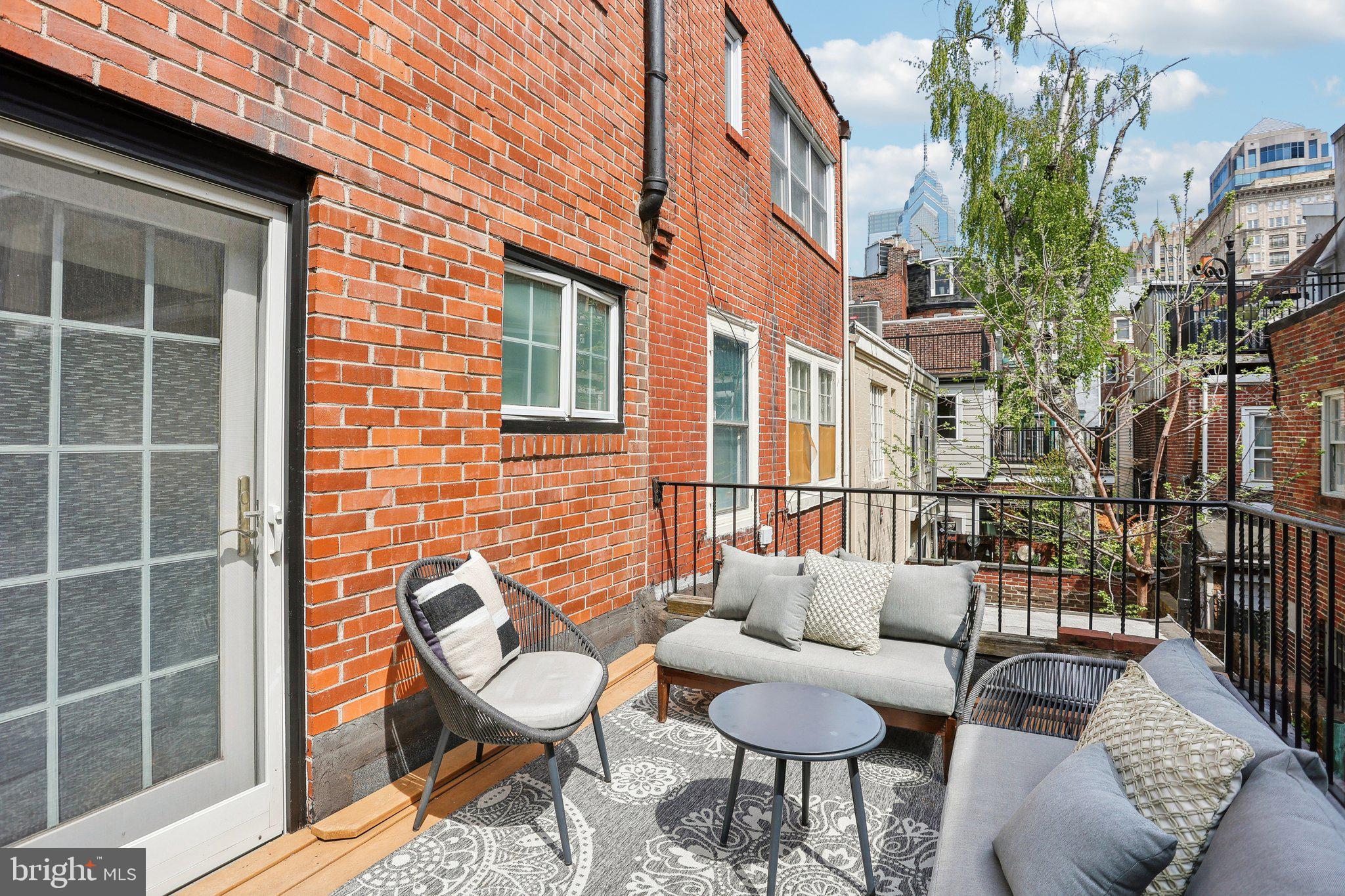 321 South Smedley Street Philadelphia, PA 19103 - Photo 18 of 39 a building outdoor space with patio furniture