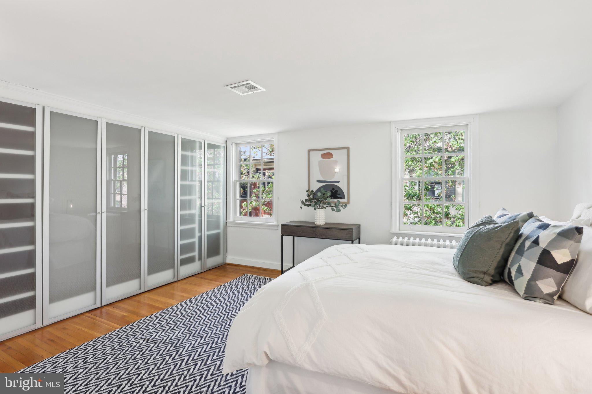 321 South Smedley Street Philadelphia, PA 19103 - Photo 29 of 39 a bedroom with a bed and a window