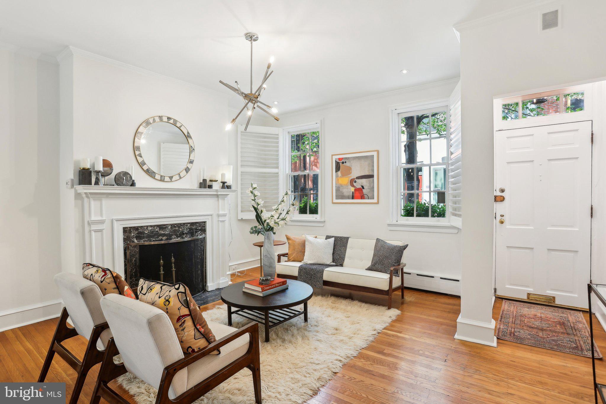 321 South Smedley Street Philadelphia, PA 19103 - Photo 3 of 39 a living room with furniture and a fireplace