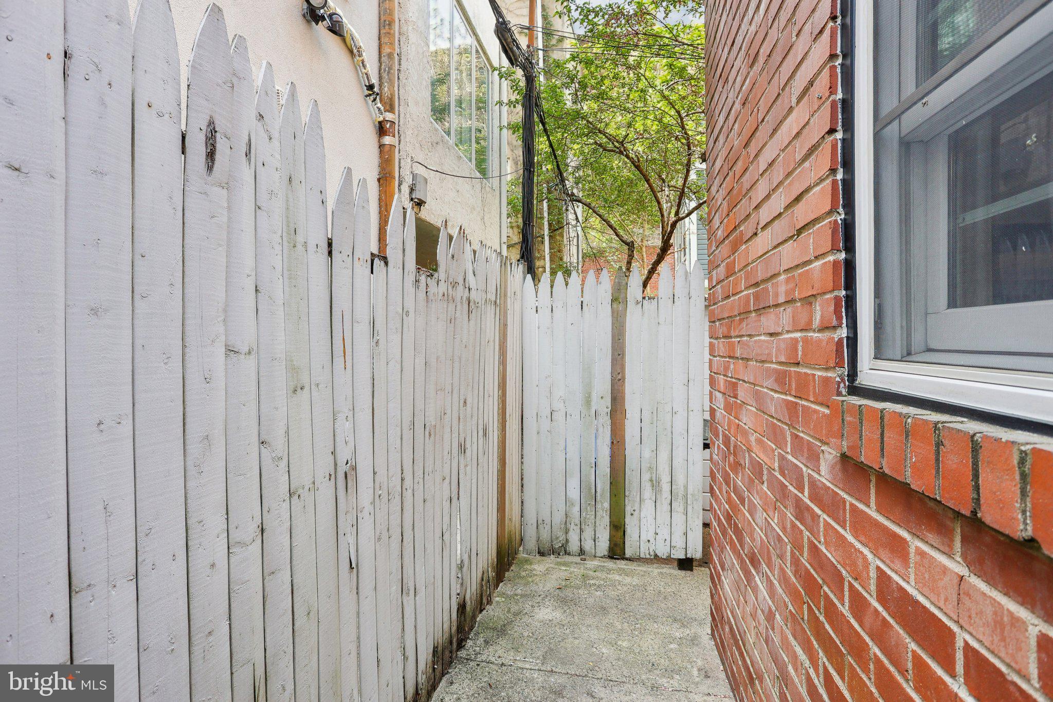 321 South Smedley Street Philadelphia, PA 19103 - Photo 39 of 39 a view of a house with a door and wooden walls