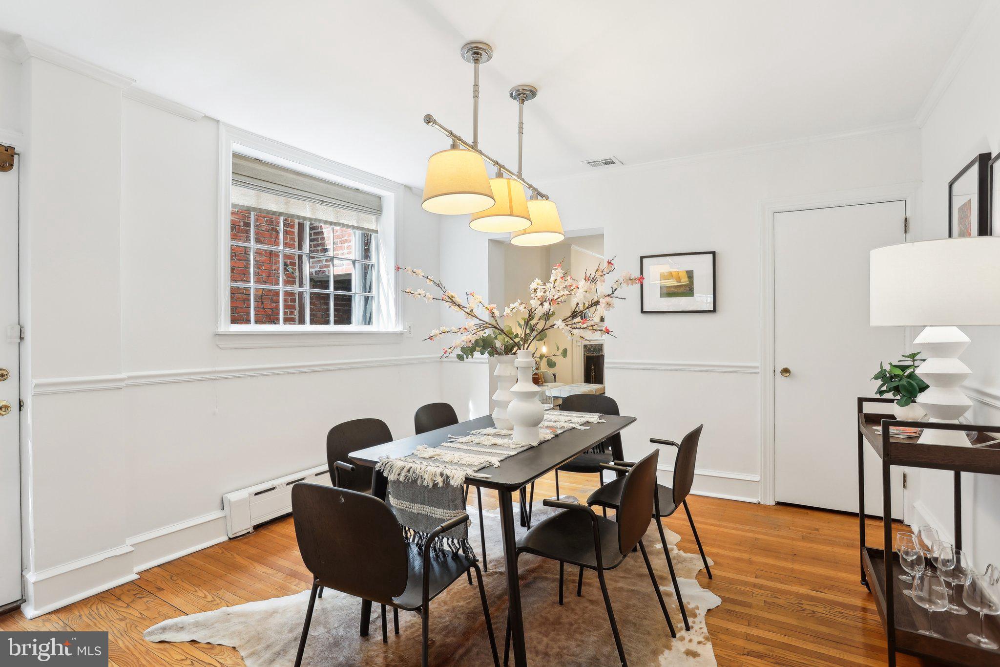 321 South Smedley Street Philadelphia, PA 19103 - Photo 8 of 39 a dining room with furniture and chandelier
