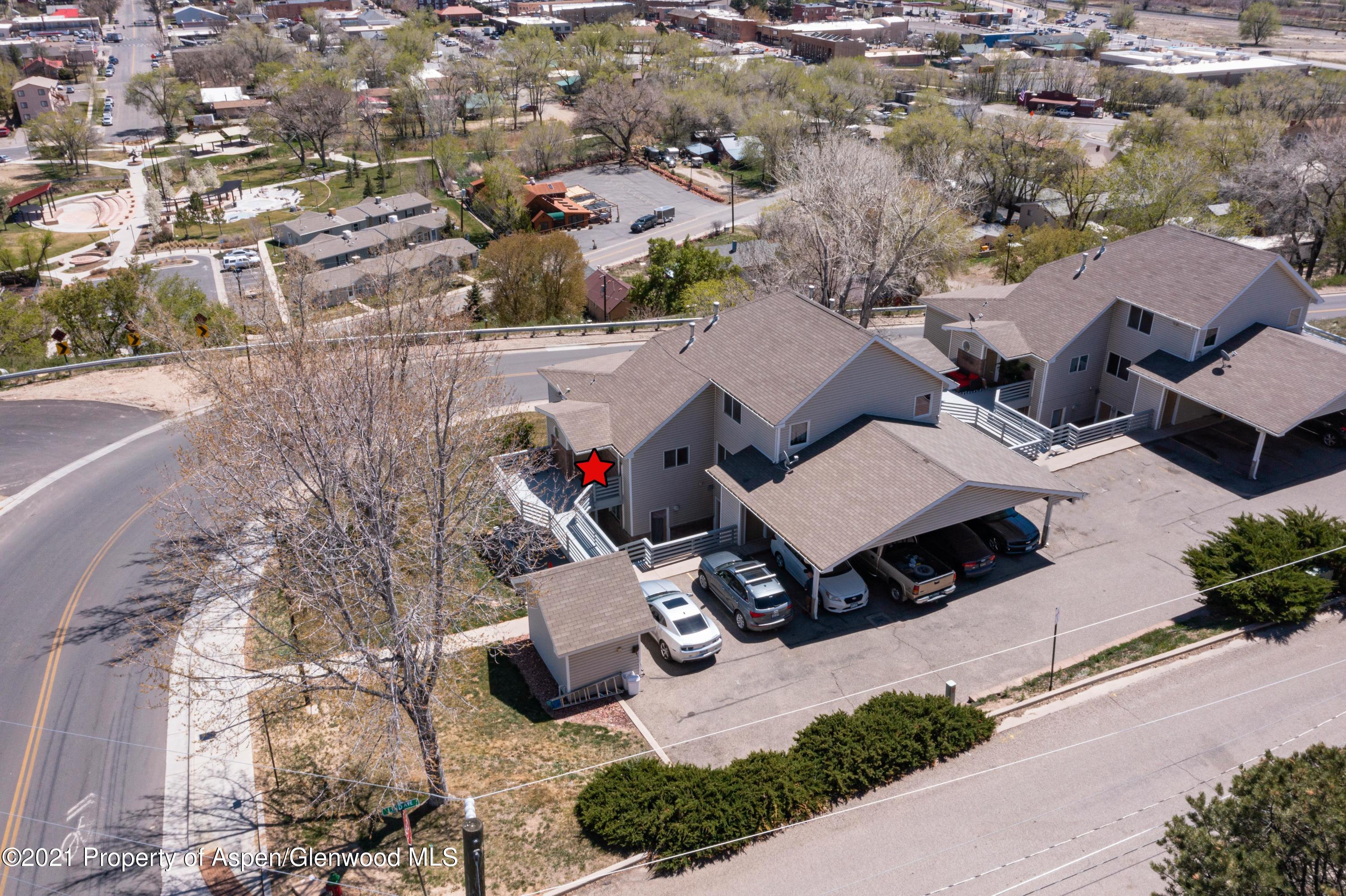 444 Lind Avenue Rifle, CO 81650 - Photo 10 of 13 an aerial view of a house with yard