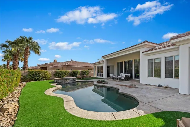 a view of a garage with rack and bicycle