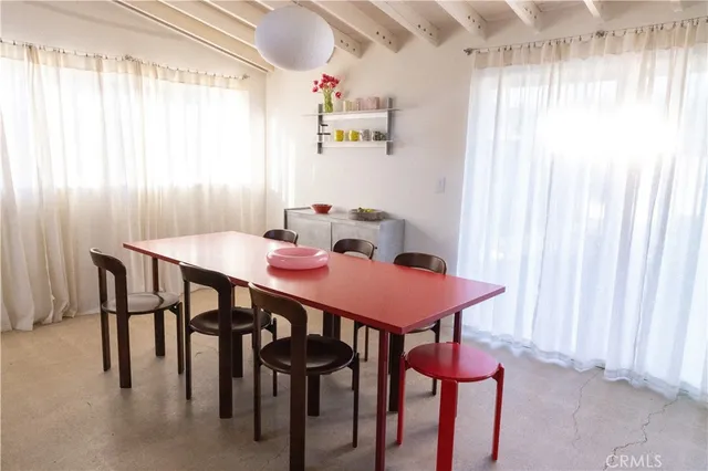 a bathroom with a sink vanity tub and a mirror