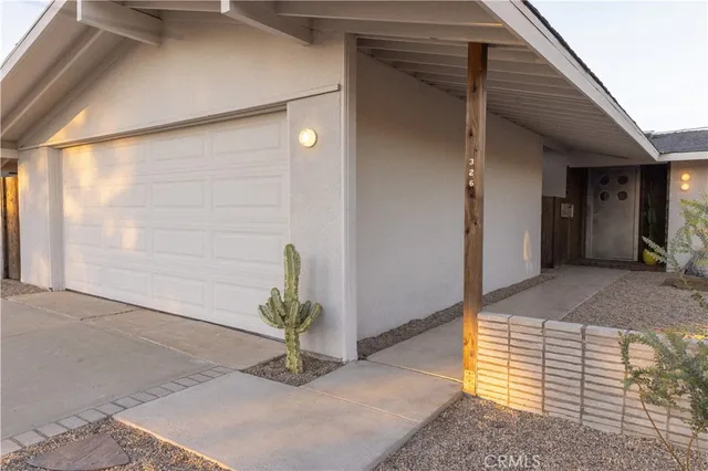 a view of a hallway to the house