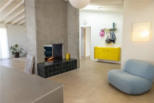 a living room with furniture and a couch