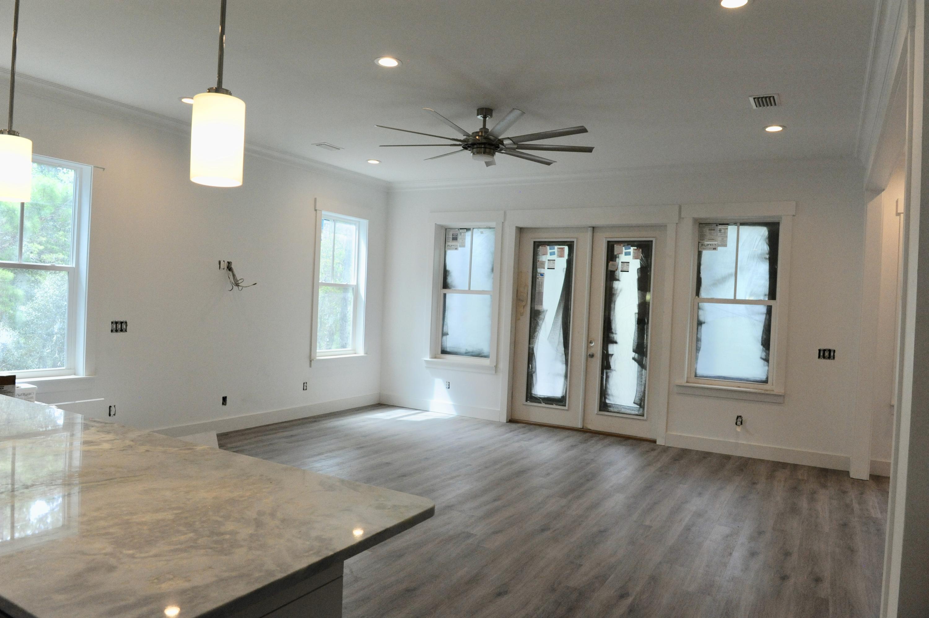 40 Matt's Way Santa Rosa Beach, FL 32459 - Photo 7 of 18 a view of a livingroom with wooden floor and window