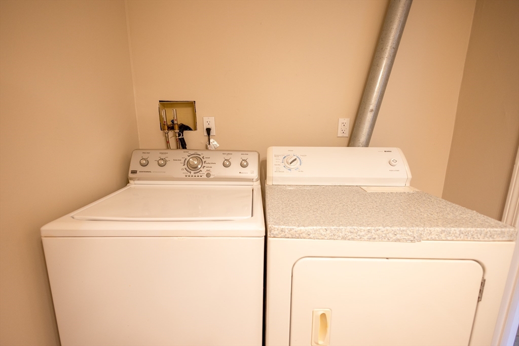 5337 B Washington Street, Unit B Boston, MA 02132 - Photo 12 of 41 a utility room with dryer and washer